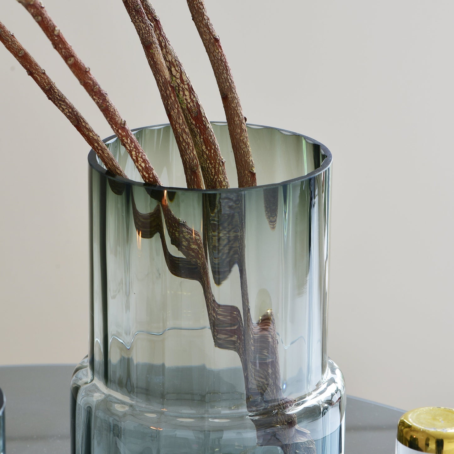 Smoky glass vases and candle holders