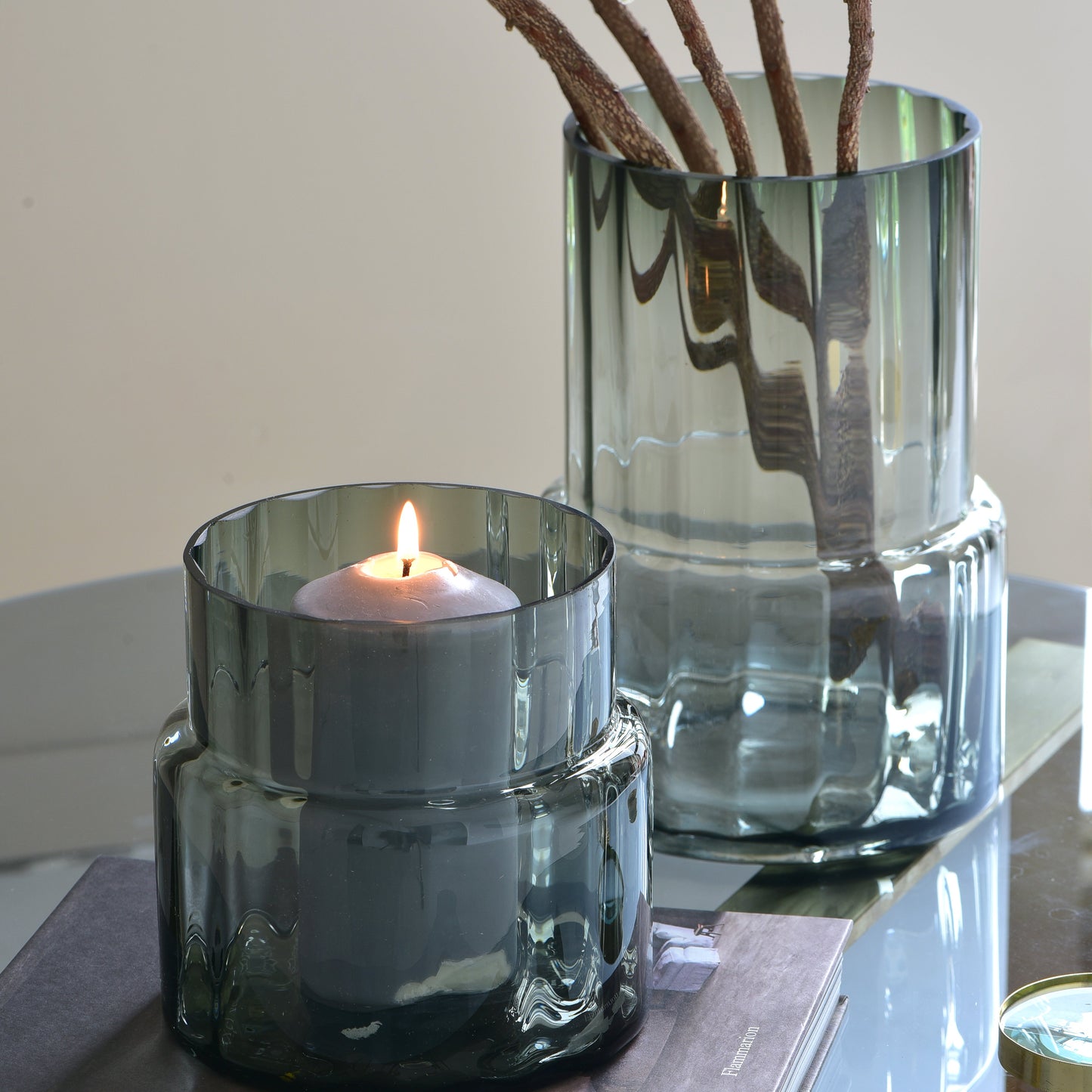 Smoky glass vases and candle holders